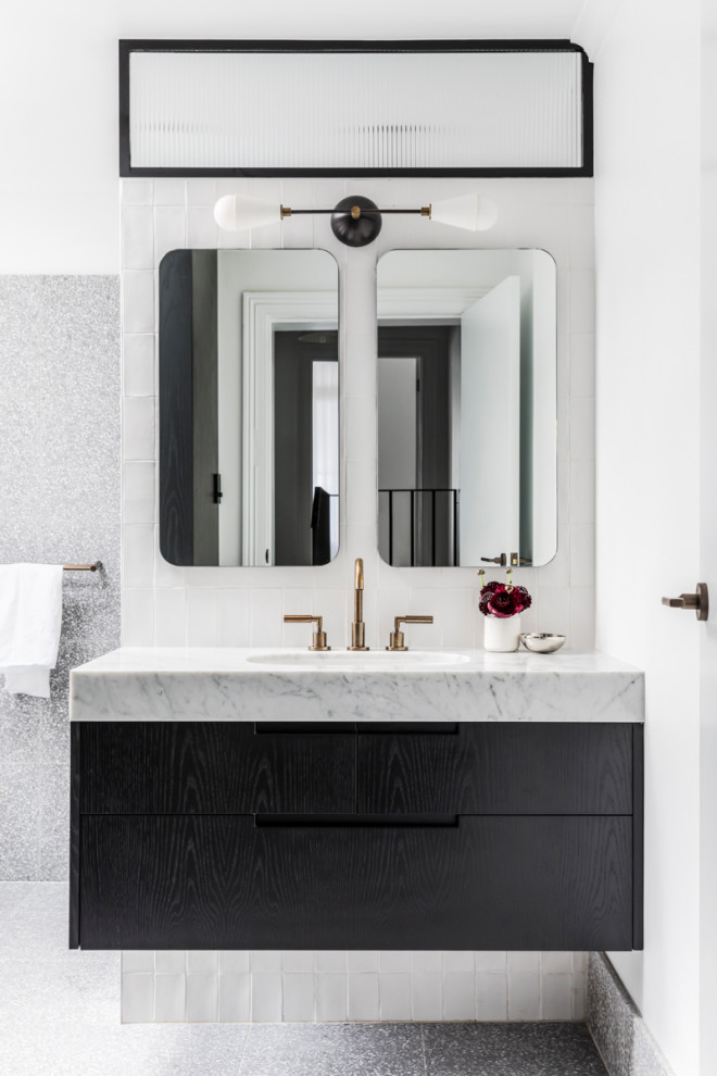 Contemporary 3/4 bathroom in Sydney with flat-panel cabinets, white tile, subway tile, white walls, an integrated sink, engineered quartz benchtops, white cabinets and grey floor.