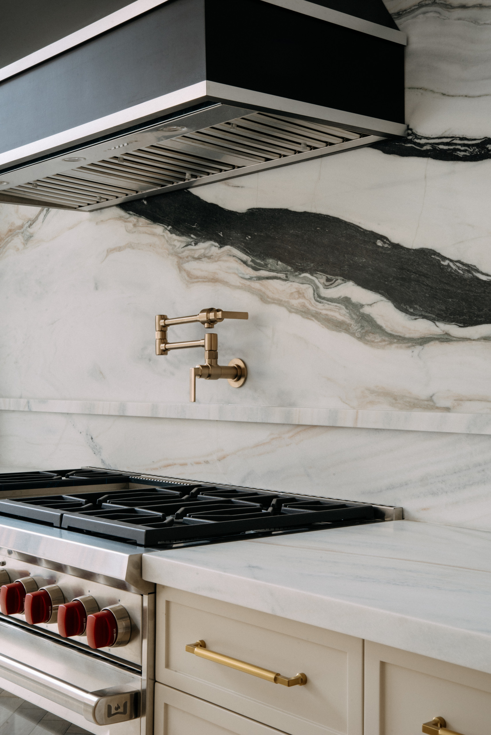 Detail of range and marble backsplash