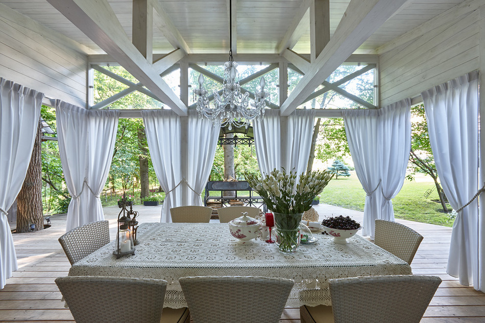 Deck - farmhouse backyard deck idea in Moscow