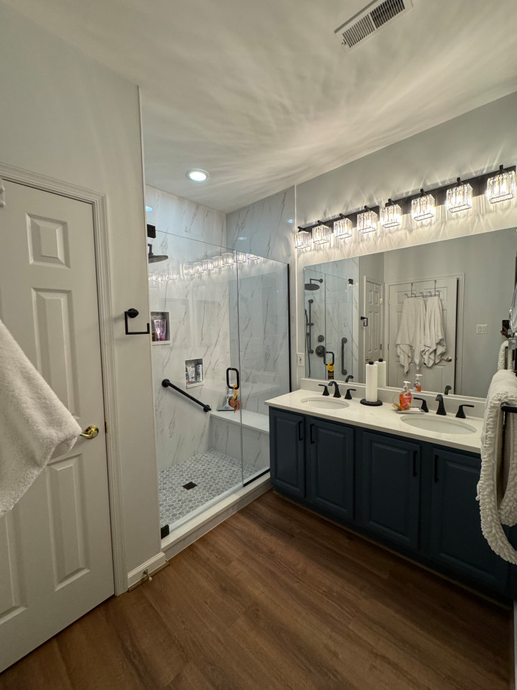 Beautiful Bathroom Renovation with Custom Walk-In Shower & Blue Vanity