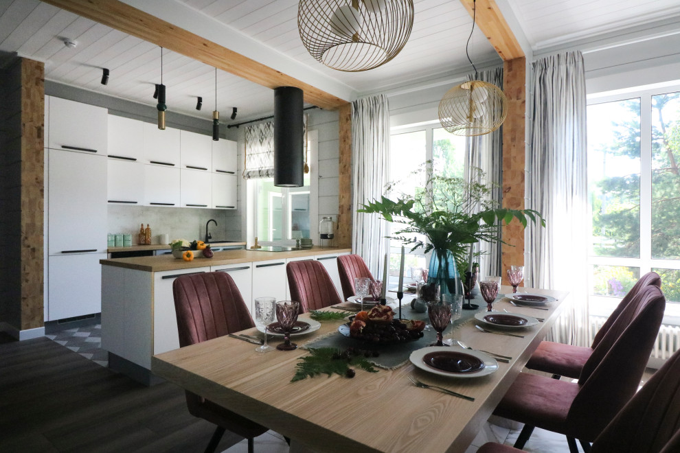 This is an example of a medium sized contemporary kitchen/dining room in Moscow with grey walls, porcelain flooring, brown floors, a wood ceiling and wood walls.