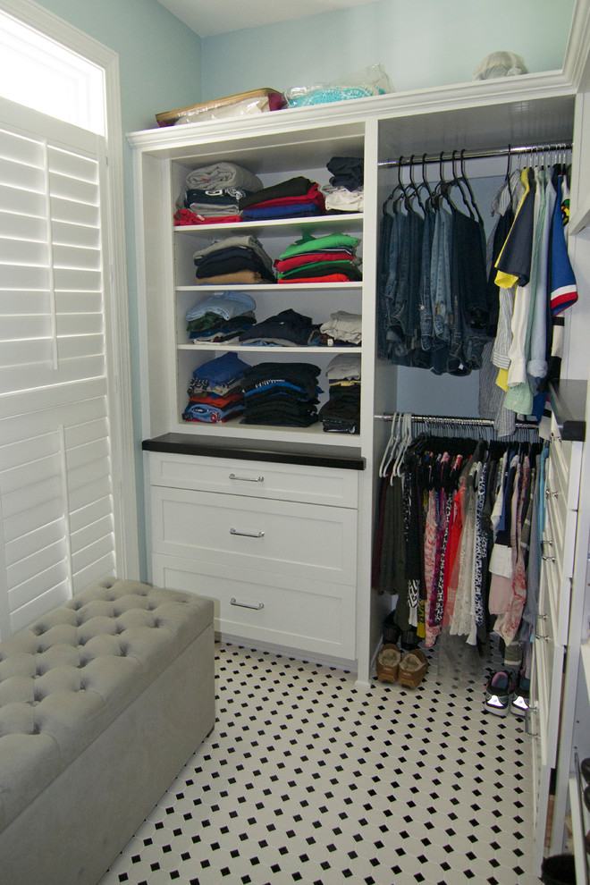 Mid-sized contemporary storage and wardrobe in Other with shaker cabinets, black cabinets and white floor.