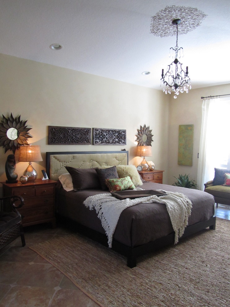 Design ideas for an eclectic bedroom in Other with beige walls.