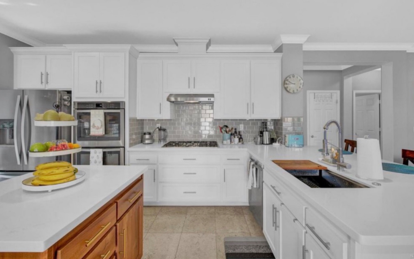 Kitchen remodel with cabinet refacing, Quartz countertops and subway tile