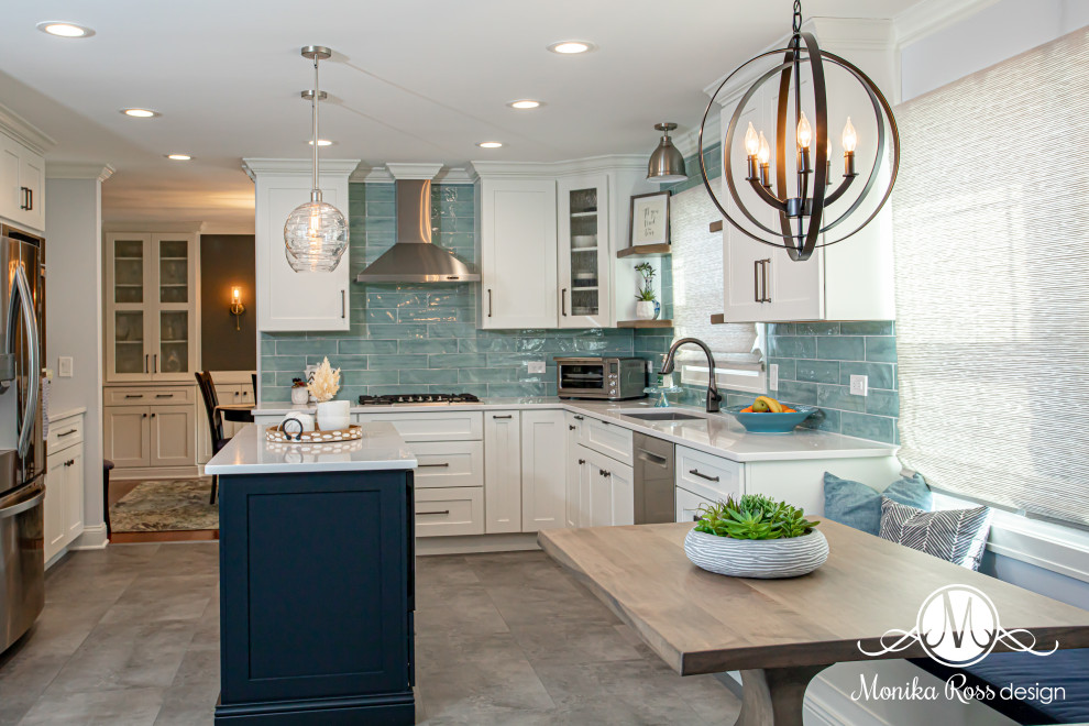 Inspiration for a large coastal u-shaped vinyl floor and gray floor eat-in kitchen remodel in Chicago with an undermount sink, shaker cabinets, white cabinets, quartz countertops, blue backsplash, ceramic backsplash, stainless steel appliances, an island and white countertops