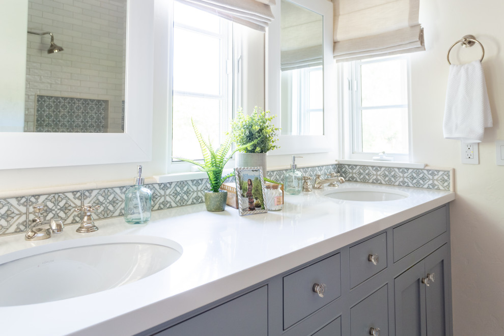 Inspiration for a mid-sized french country kids' white tile and ceramic tile mosaic tile floor, beige floor and double-sink bathroom remodel in Santa Barbara with blue cabinets, white walls, an undermount sink, quartz countertops, white countertops, a niche and a built-in vanity