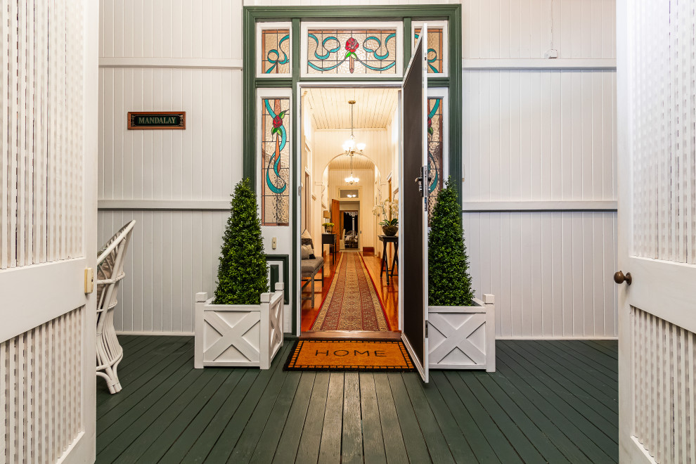 Photo of a traditional entryway in Brisbane with a single front door.
