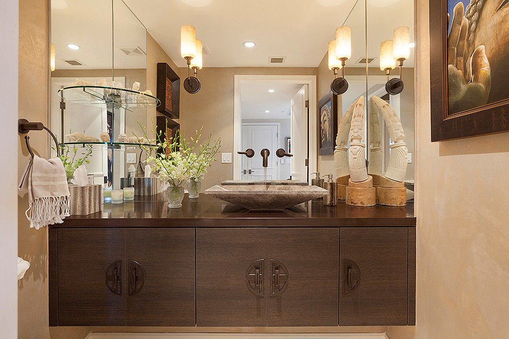 This is an example of a mid-sized contemporary bathroom in Miami with beige walls, medium wood cabinets, flat-panel cabinets, copper benchtops and brown benchtops.