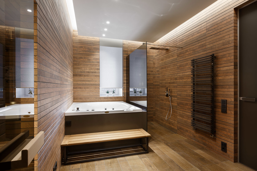 This is an example of a mid-sized contemporary bathroom in Saint Petersburg with a hot tub, an open shower, beige tile, ceramic tile, porcelain floors and with a sauna.