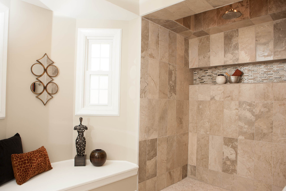 Photo of a large traditional master bathroom in St Louis with an open shower, beige tile, porcelain tile and beige walls.
