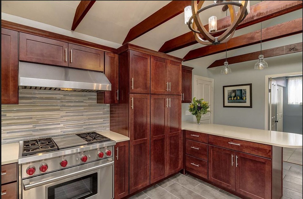 Mid-sized transitional home design photo in Seattle