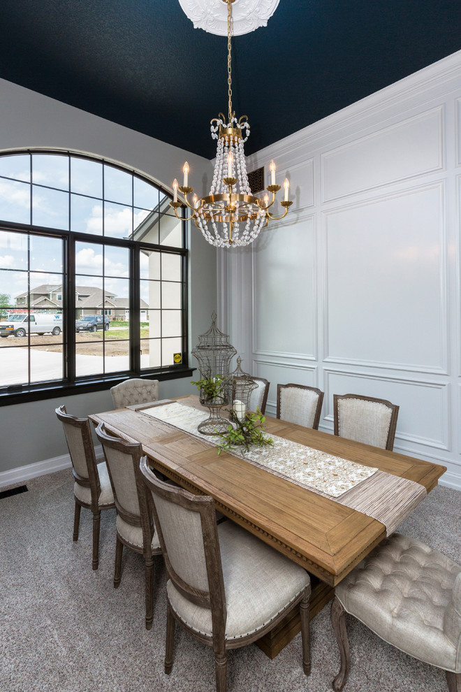Example of an eclectic dining room design in Cedar Rapids