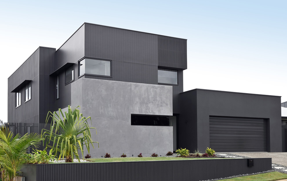 Design ideas for a contemporary two-storey house exterior in Sunshine Coast.