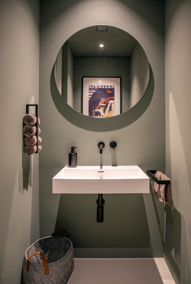 Inspiration for a contemporary powder room in Munich with grey floor and a floating vanity.
