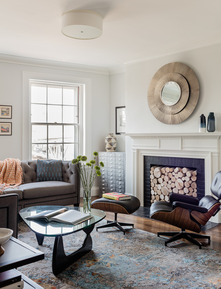 Expansive transitional open concept living room in Boston with white walls, dark hardwood floors, a standard fireplace, a brick fireplace surround and brown floor.