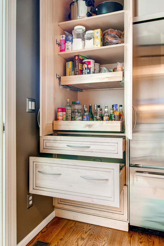 Mid-sized transitional u-shaped dark wood floor kitchen pantry photo in Denver with an undermount sink, flat-panel cabinets, light wood cabinets, granite countertops, beige backsplash, glass tile backsplash, stainless steel appliances and an island