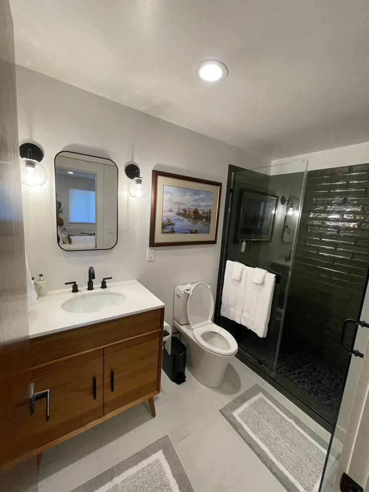 Modern Bathroom Transformation with Custom Tile Shower.