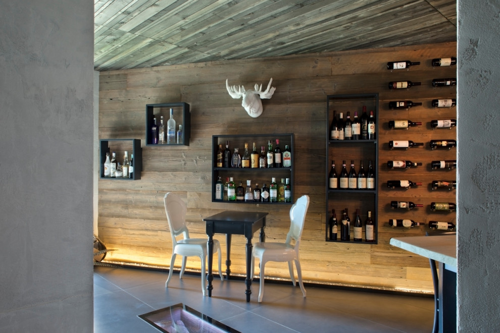 Design ideas for a large contemporary wine cellar in Other with porcelain floors, display racks and grey floor.