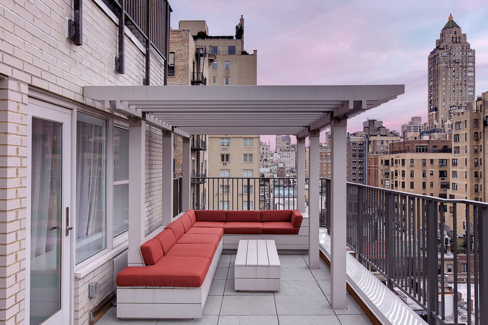 Design ideas for a contemporary deck in New York with a pergola.