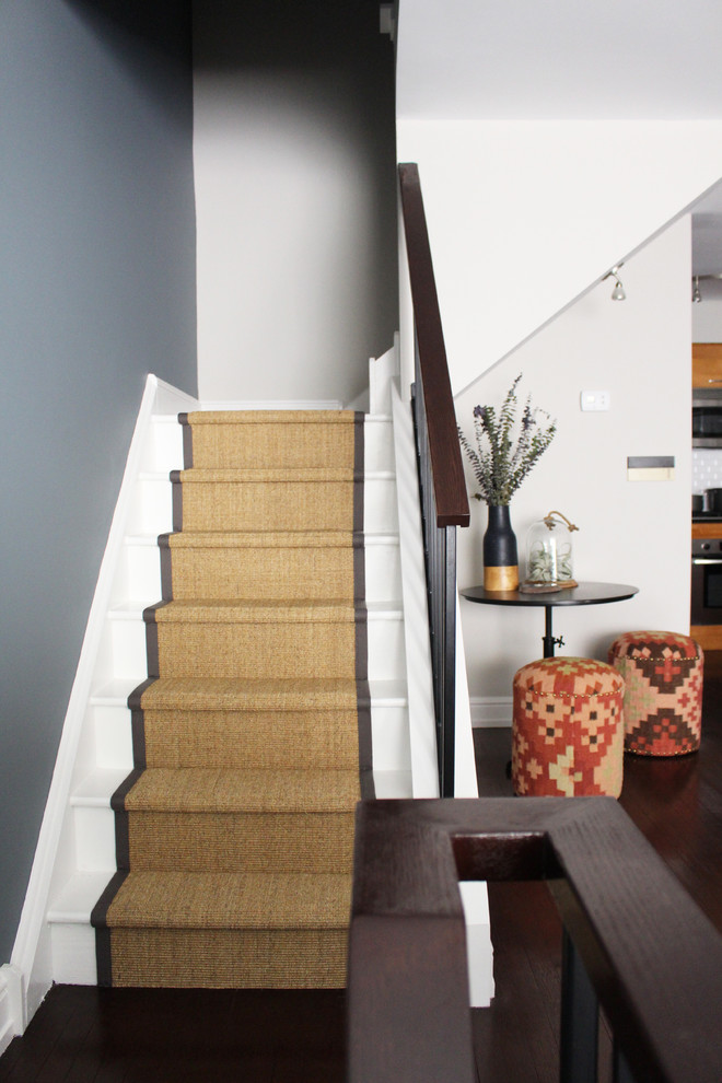 Mid-sized contemporary painted wood l-shaped staircase in Philadelphia with painted wood risers.