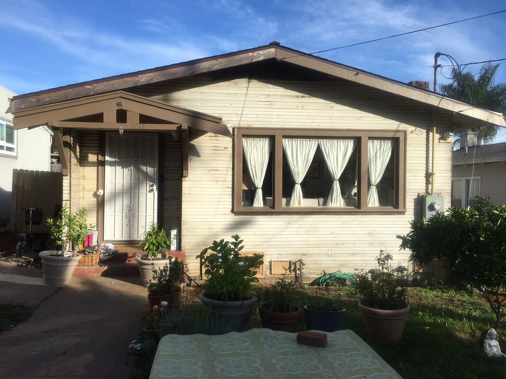 Restore the 1925 redwood siding or install Hardie?