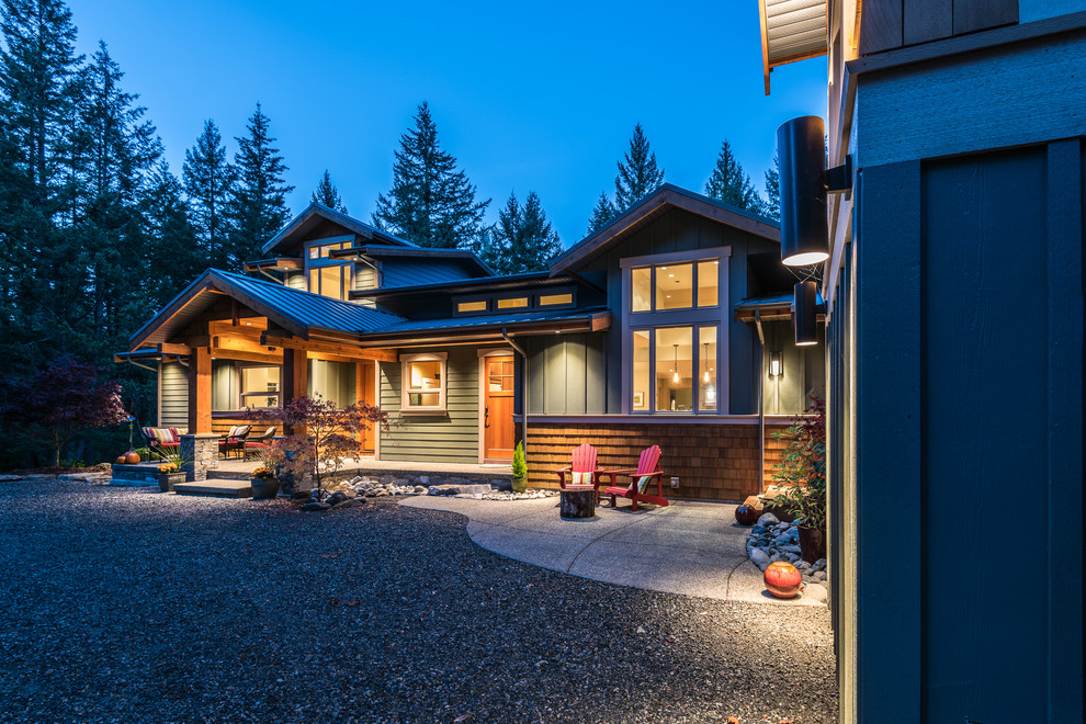 Mountain style home design photo in Vancouver