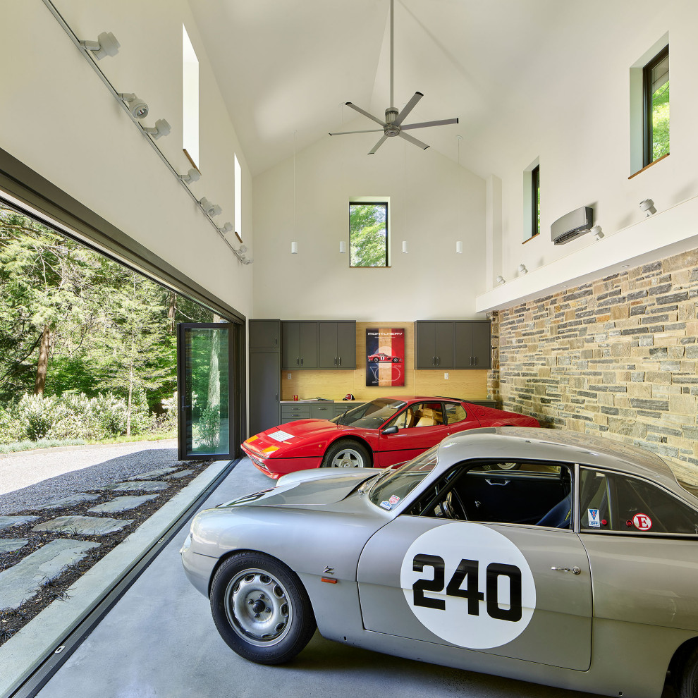 Design ideas for a contemporary detached three-car garage in Philadelphia.