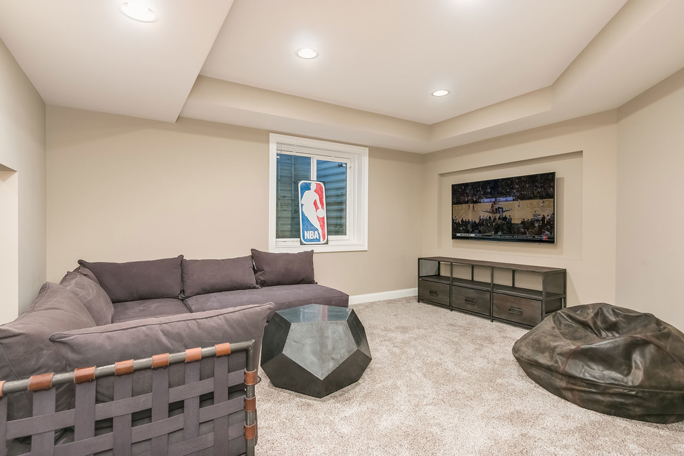 Design ideas for an expansive transitional look-out basement in Chicago with grey walls, dark hardwood floors, a corner fireplace, a brick fireplace surround and brown floor.