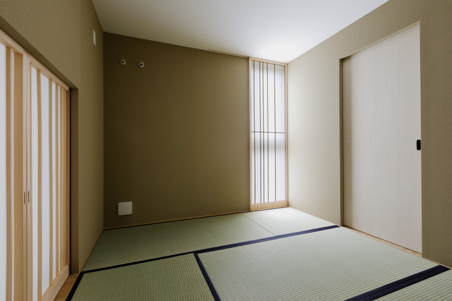 人が集まる家 giapponese-moderno-camera-da-letto