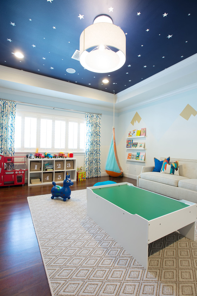 Mid-sized transitional gender-neutral kids' playroom in Orlando with white walls and dark hardwood floors for kids 4-10 years old.
