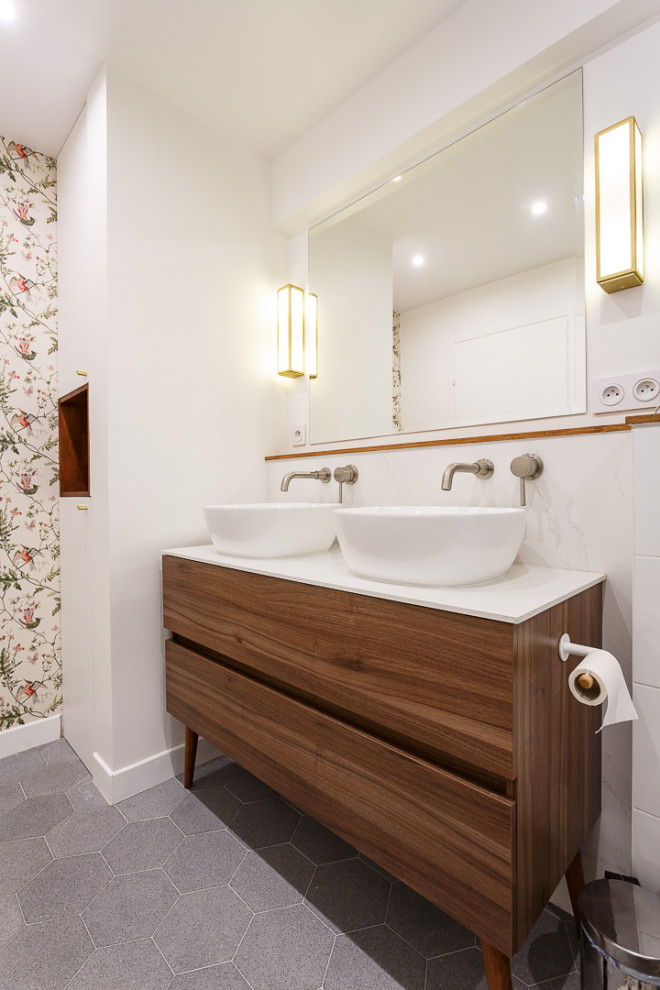 Mid-sized modern master bathroom in Paris with flat-panel cabinets, dark wood cabinets, a corner tub, a shower/bathtub combo, white tile, marble, white walls, cement tiles, a console sink, grey floor, a shower curtain, white benchtops, a double vanity and a freestanding vanity.