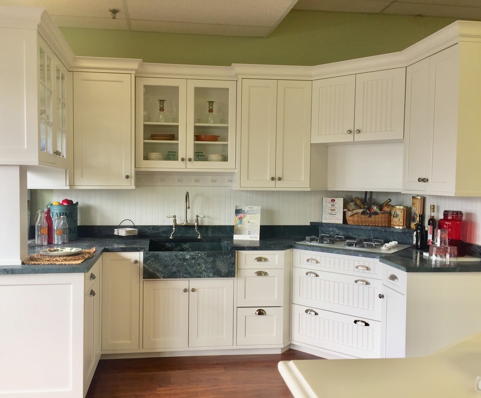Example of a beach style home design design in Boston