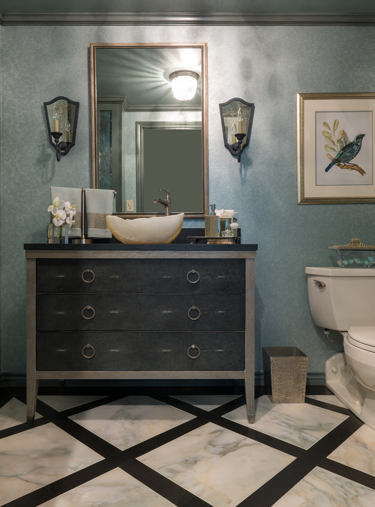 Photo of a small transitional powder room in Dallas with grey cabinets, white tile, black tile, green walls, marble floors, a vessel sink, granite benchtops, a two-piece toilet and furniture-like cabinets.