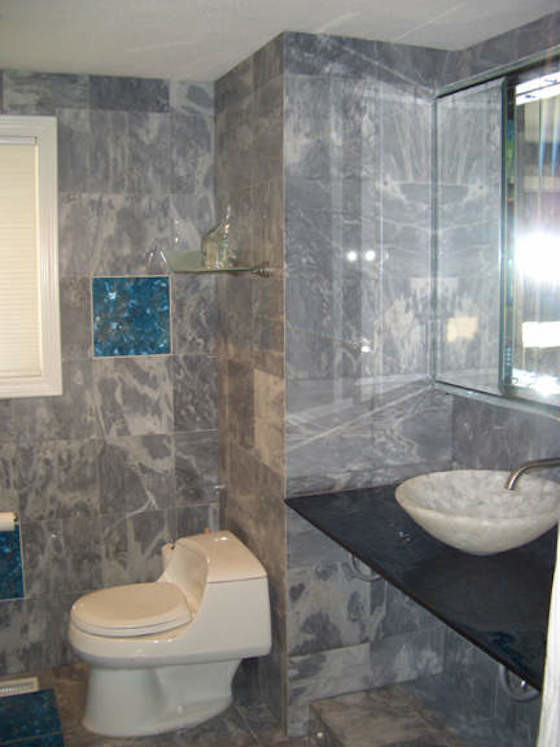 Inspiration for a large gray tile and ceramic tile bathroom remodel in Providence with a drop-in sink