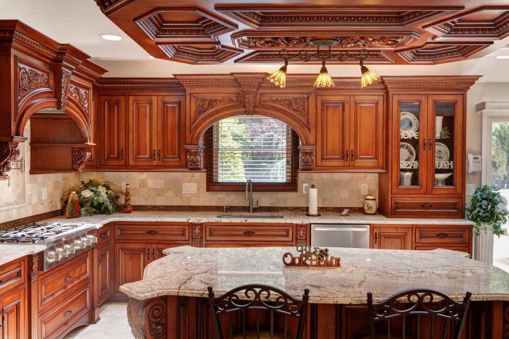 Photo of a large traditional u-shaped kitchen/diner in New York with an integrated sink, shaker cabinets, brown cabinets, engineered stone countertops, beige splashback, engineered quartz splashback, an island, beige worktops and a coffered ceiling.