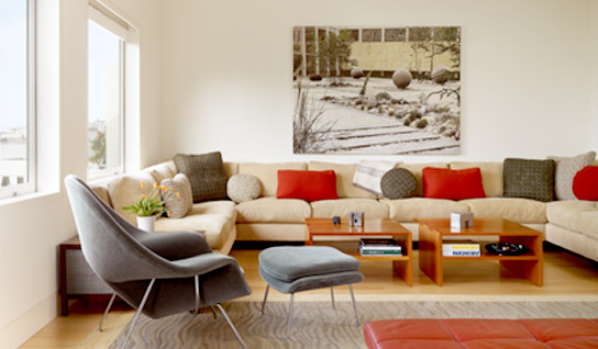 Design ideas for a large modern open concept family room in San Francisco with white walls and light hardwood floors.