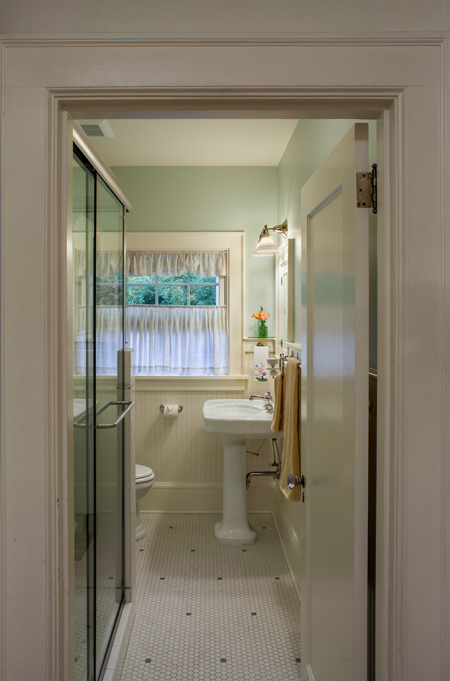 Small arts and crafts 3/4 bathroom in Portland with a pedestal sink, a double shower, blue walls, mosaic tile floors, white tile and subway tile.