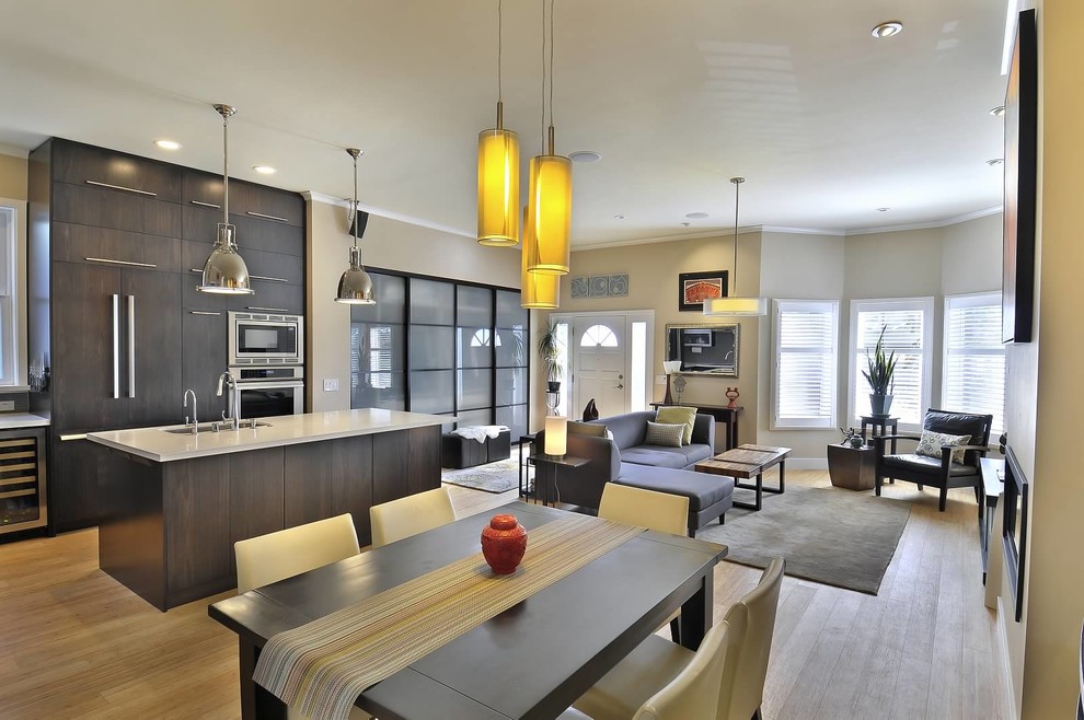 Design ideas for a contemporary open plan dining in San Francisco with light hardwood floors.