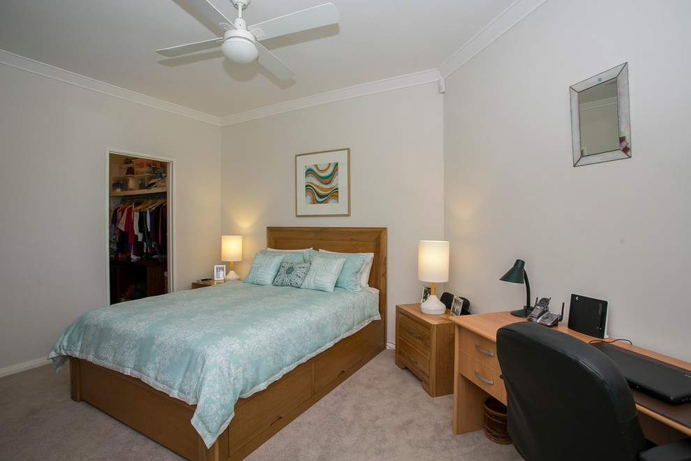 Design ideas for a mid-sized contemporary bedroom in Perth with white walls and carpet.