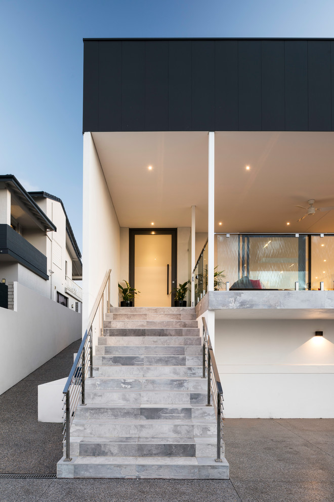 Contemporary entryway in Perth with white walls, a single front door and grey floor.