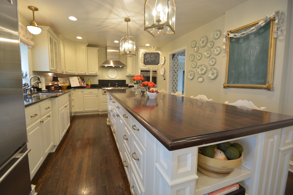 Traditional kitchen in Milwaukee with wood benchtops.