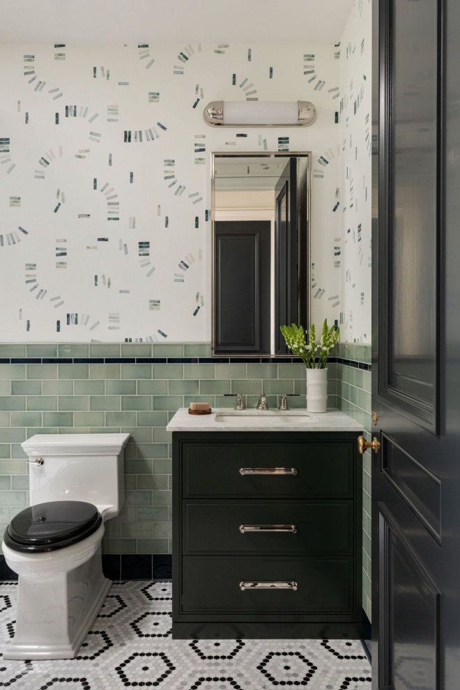 Burling - Example of a transitional green tile and subway tile mosaic tile floor, multicolored floor and wallpaper powder room design in Chicago with flat-panel cabinets, black cabinets, multicolored walls, an undermount sink, white countertops and a built-in vanity