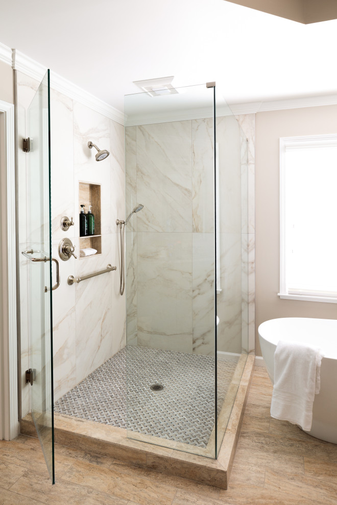 Inspiration for a large transitional master bathroom in Atlanta with raised-panel cabinets, green cabinets, a freestanding tub, a corner shower, a two-piece toilet, white tile, porcelain tile, beige walls, travertine floors, an undermount sink, quartzite benchtops, beige floor, a hinged shower door, multi-coloured benchtops, a niche, a double vanity and recessed.