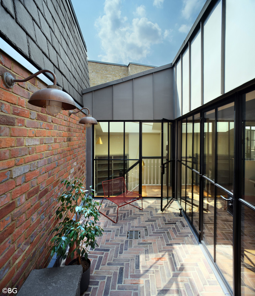 Inspiration for a medium sized modern patio in London.