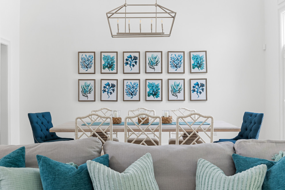 Inspiration pour une salle à manger marine de taille moyenne avec une banquette d'angle, un mur bleu, un sol en vinyl, un sol marron et un plafond voûté.