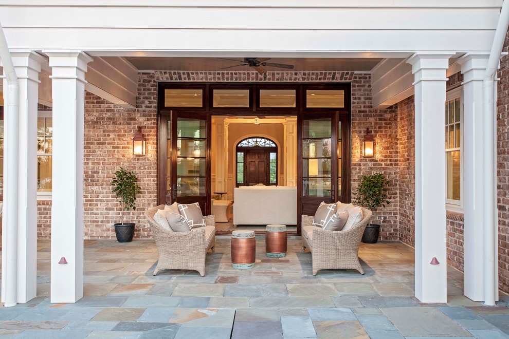 Inspiration for a huge transitional backyard outdoor kitchen deck remodel in Charleston