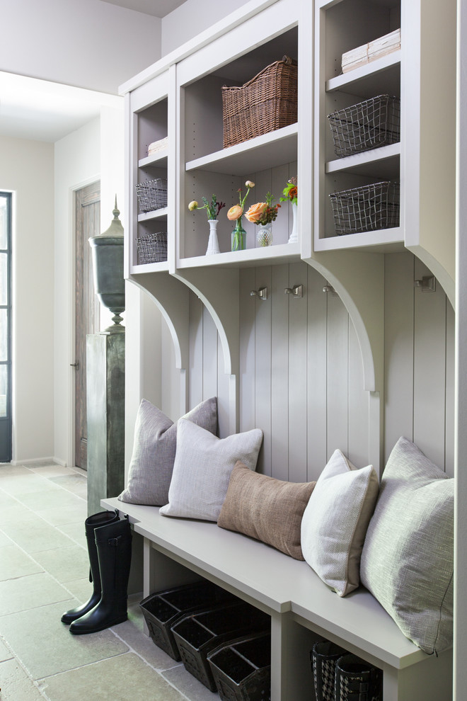 Mid-sized transitional mudroom in Nashville with grey walls, limestone floors and grey floor.