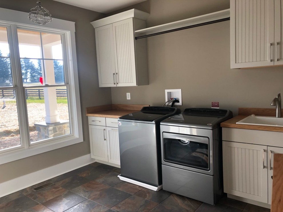 Inspiration for a large rustic l-shaped kitchen remodel in Baltimore with recessed-panel cabinets and distressed cabinets