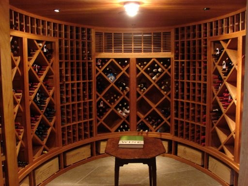 Large traditional wine cellar in Bridgeport with slate floors and diamond bins.