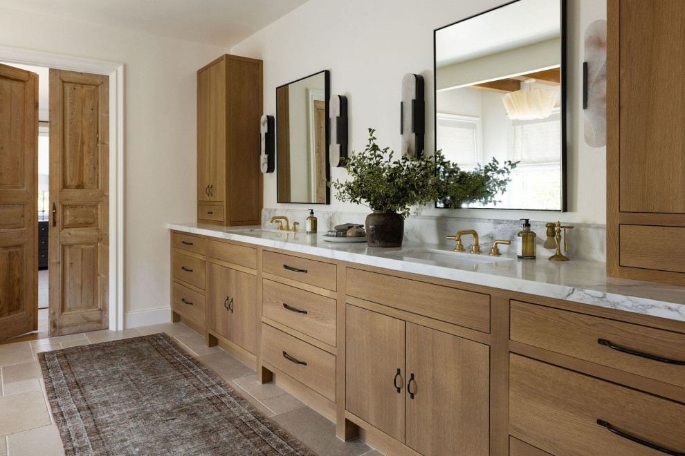 Photo of a transitional bathroom in Sacramento with flat-panel cabinets, medium wood cabinets, white walls, an undermount sink, beige floor, white benchtops, a double vanity and a built-in vanity.